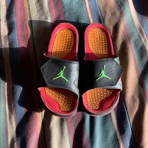 Jordan Slide Sandals with Red, Black, and Green Accents